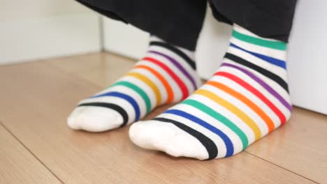 colorful striped socks on feet