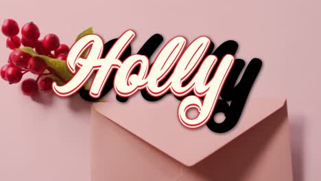 animation of holly text banner over red cherries and envelope on pink surface