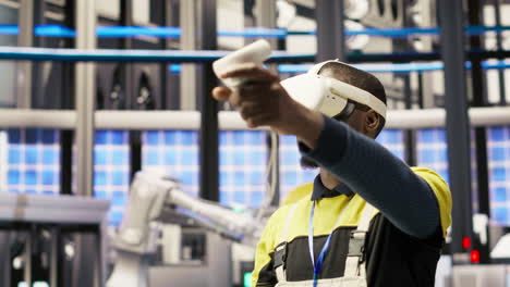 vertical video engineer in smart factory does maintenance using vr headset tech