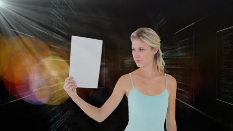 animation of icons over caucasian woman holding blank sheet on black background