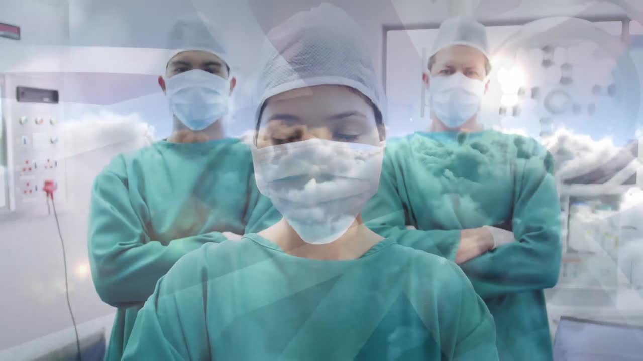 animación de la bandera del reino unido sobre un grupo de médicos con máscaras faciales