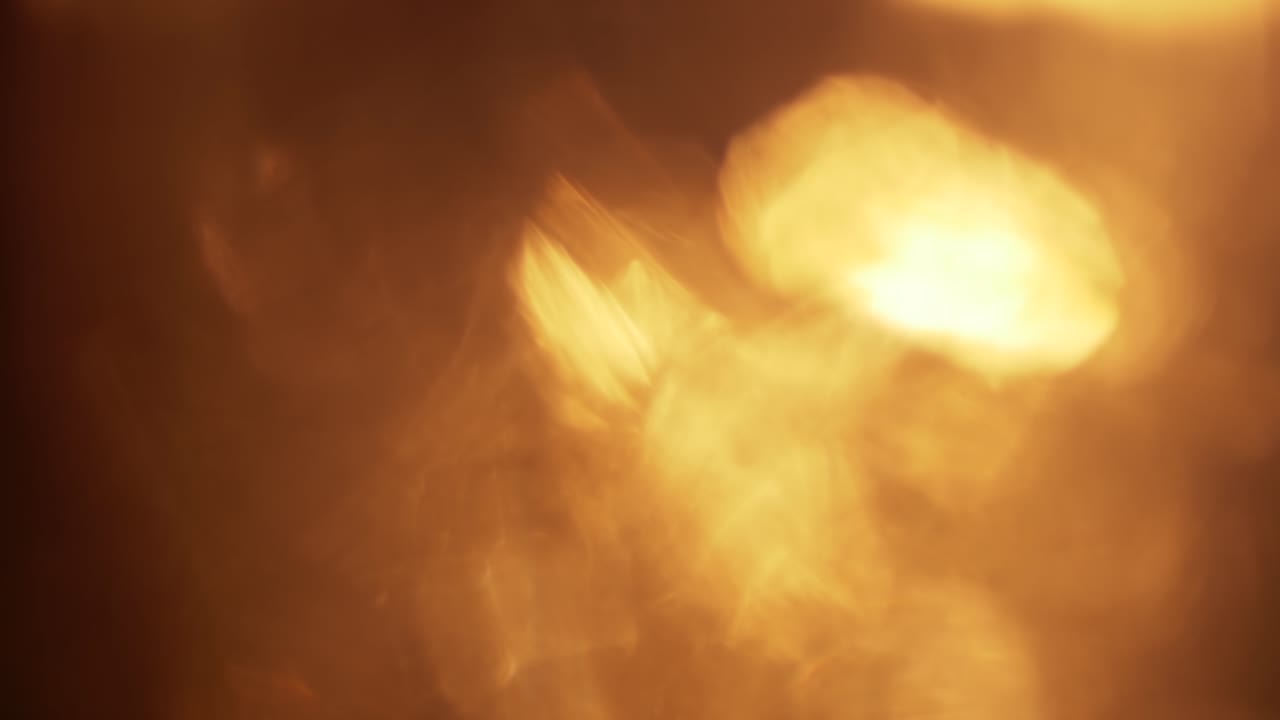 Sfondo di transizione con perdite di luce bokeh calde e dorate