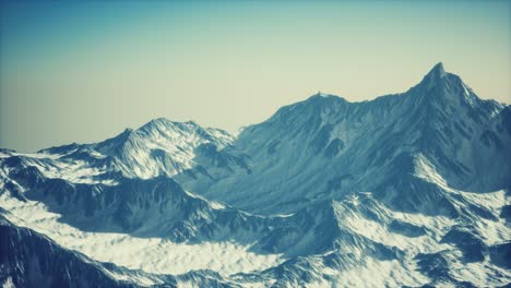 Aerial-view-of-the-Alps-mountains-in-snow