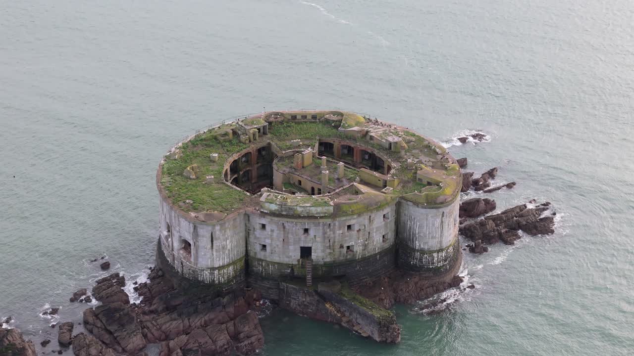Neglected Offshore Stack Rock Fort In Milford Haven, Wales, United Kingdom. Aerial Drone Shot