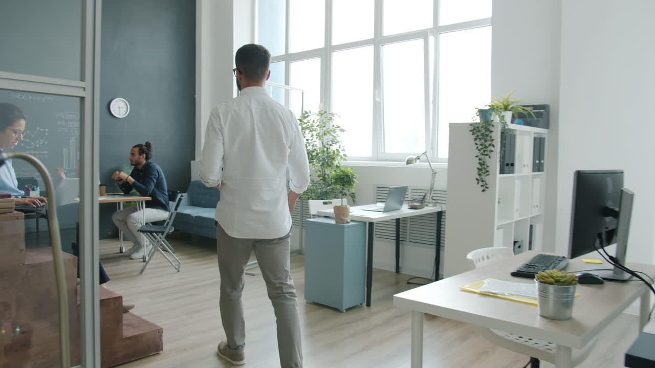 Business Meeting and Presentation in Modern Office