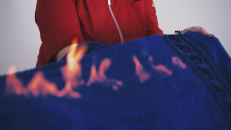 therapist does unique massage with flame to patient closeup