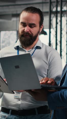 vertical video business associates collaborating on a project with data insights