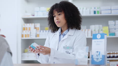 friendly pharmacist helping patient