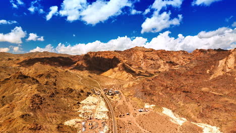 amazing view on the rocks in mojave desert in california. drone rising above the valley among the mountains.