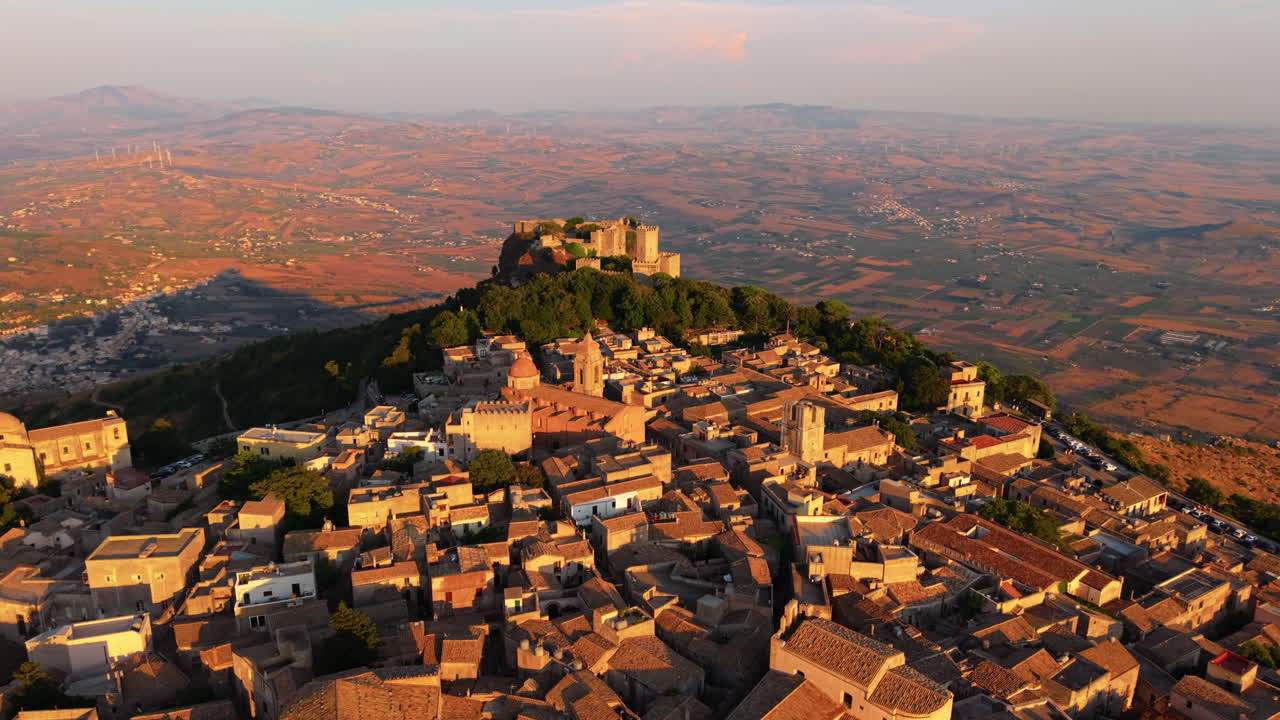 Erice Village And Castle of Venus During Golden Hour In Sicily, Italy. - aerial shot