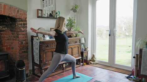woman doing yoga at home