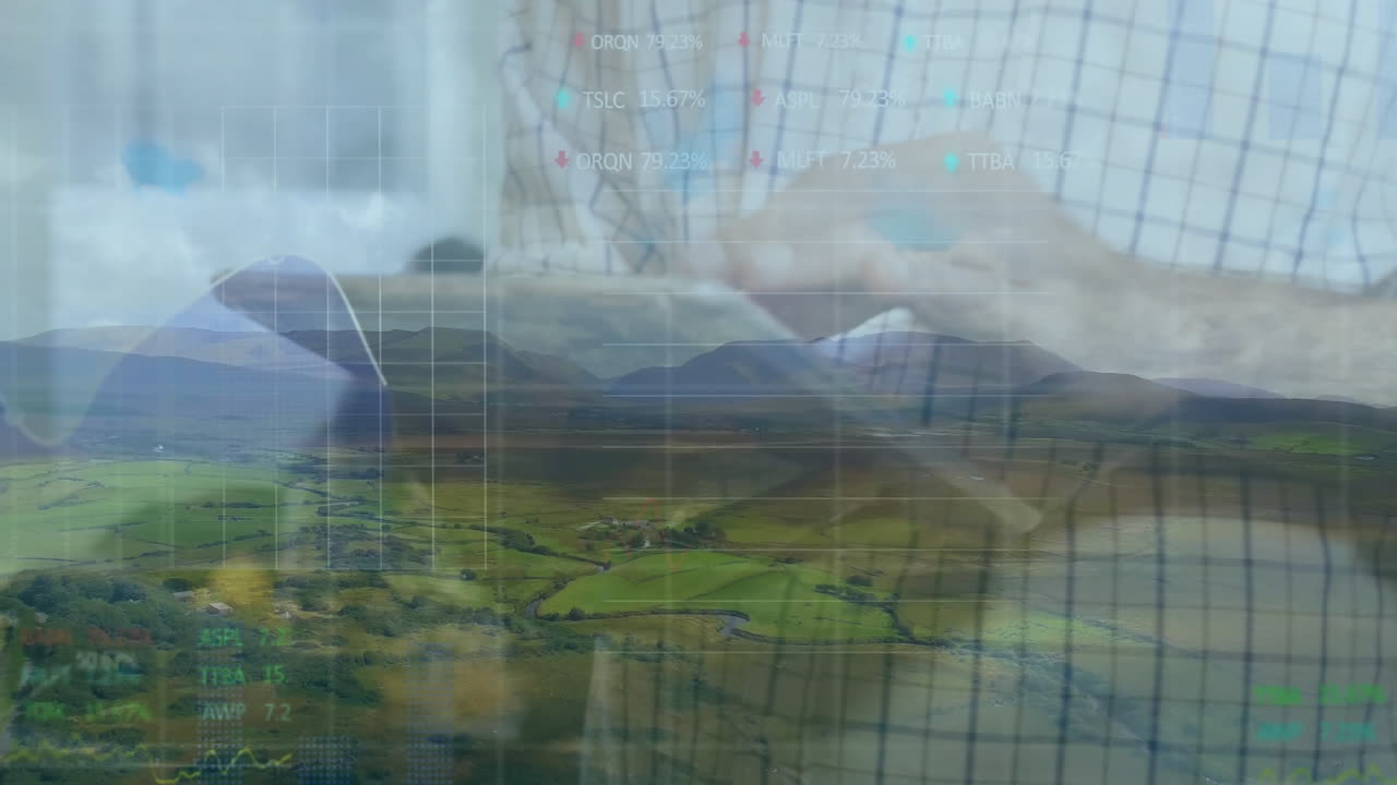 Man interacting with tablet in rural landscape, displaying floating finance charts and data grids