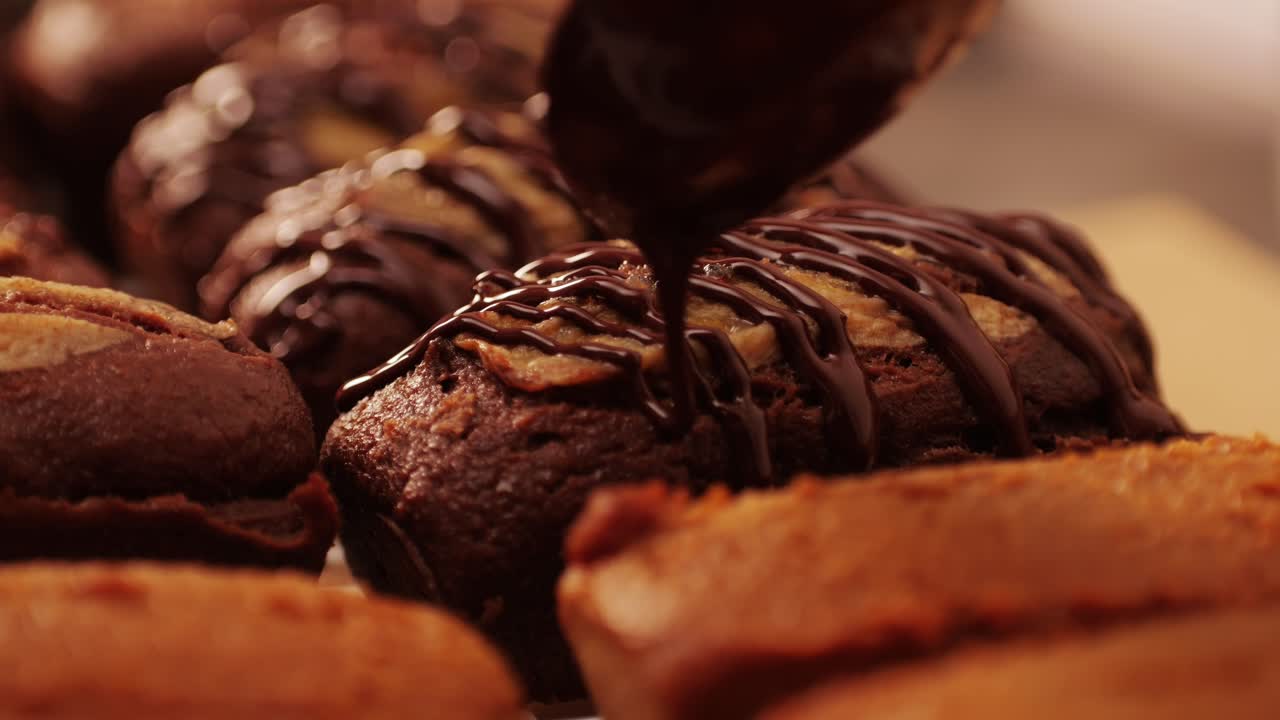 Fresh bake double chocolate banana artesian bread in bakery shop close-up. Artisan bread is making by skill bakers using natural and high-quality ingredients. Food with health and flavour benefits. Sweet breads for dessert and breakfast