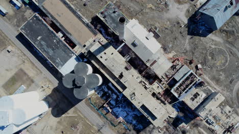 Aerial-view-looking-down-on-sugar-mill-in-rocky-mountains