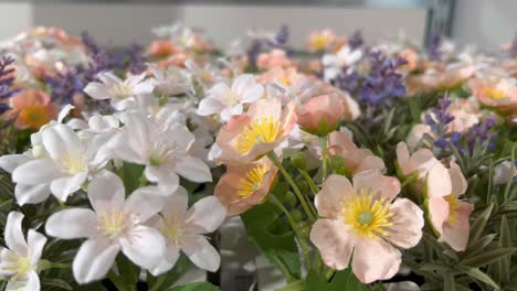 A-close-up-shot-of-cluster-of-beautiful-flowers-being-placed-in-a-mall