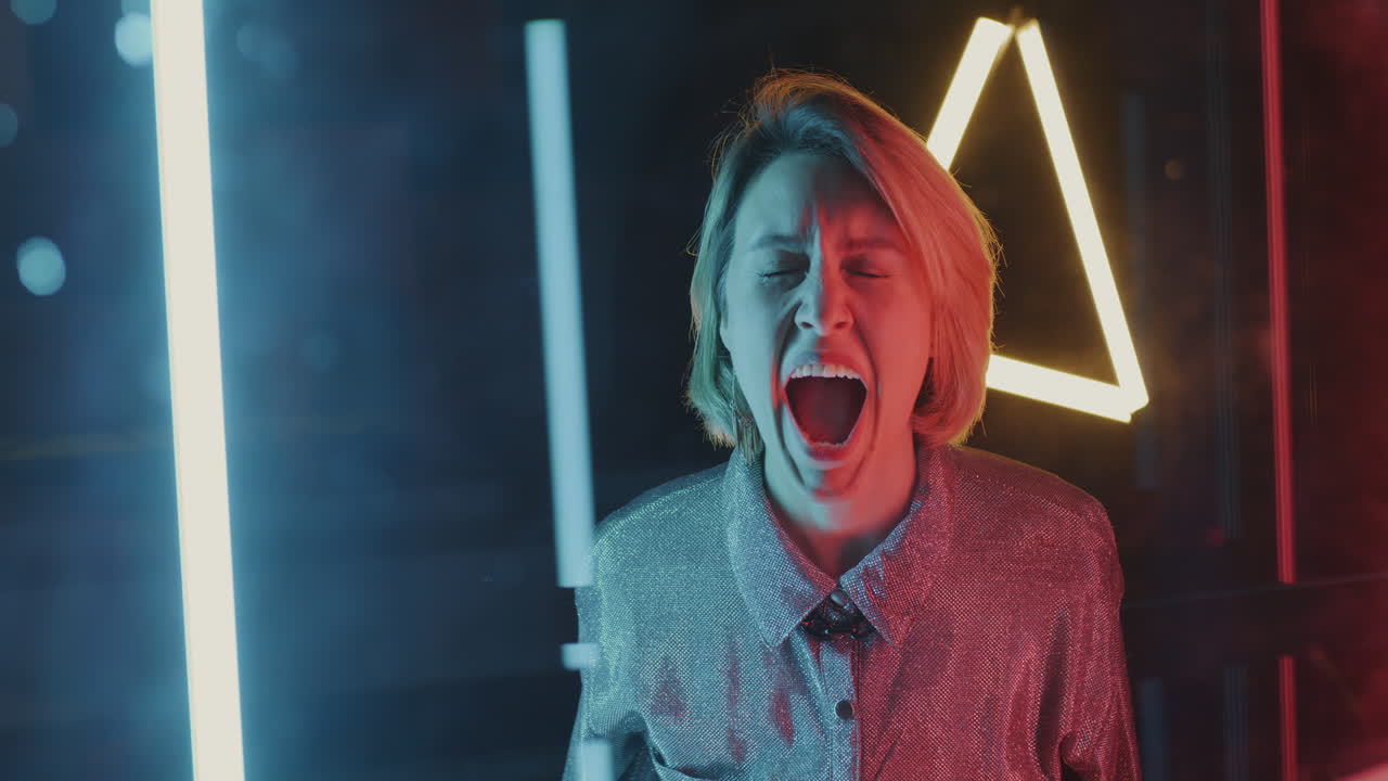 Woman screaming in neon light