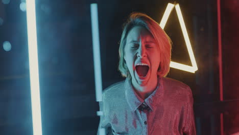 woman screaming in neon light