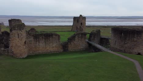 old coastal north wales flint castle museum remains aerial left orbit low across horizon