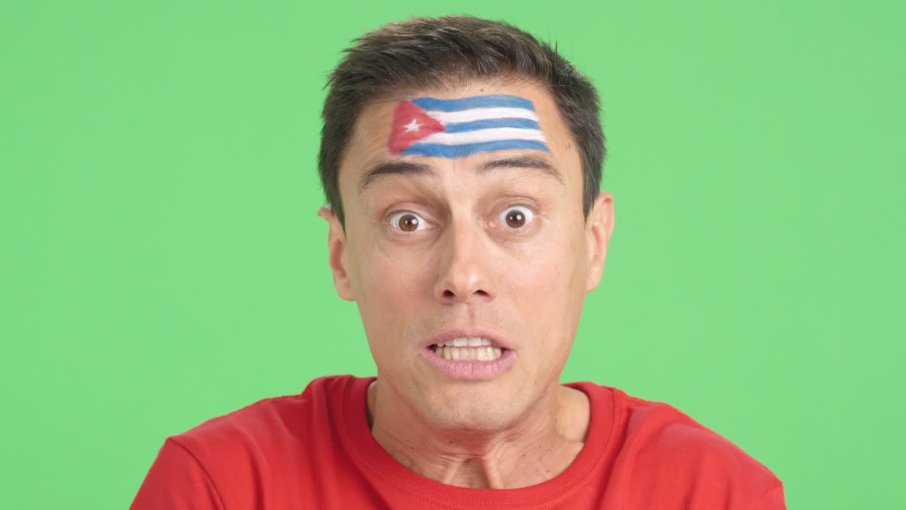 Man with cuban national flag upset with a referee