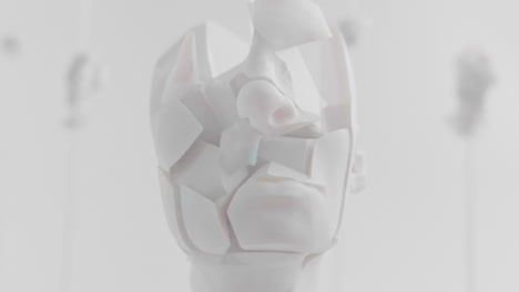destroyed android head on spike in white space