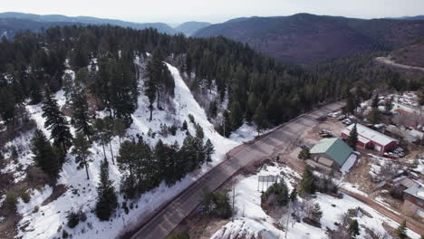 aerial drone shot of road in to cloudcroft, new mexico, boom up
