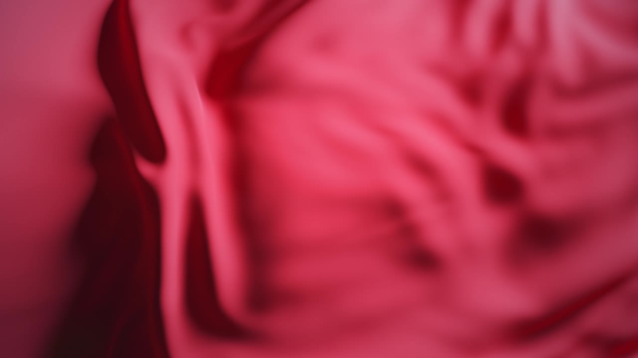 Red wave fabric surface. Abstract soft background. Seamless loop 3d render