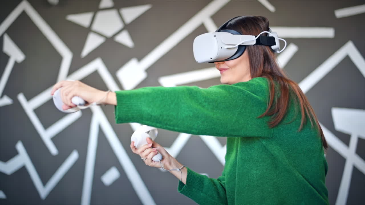A young interested woman playing in VR games using VR glasses and controllers. Slow motion