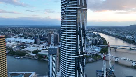 aerial shot orbiting meriton suites herschel street, brisbane city skyscraper