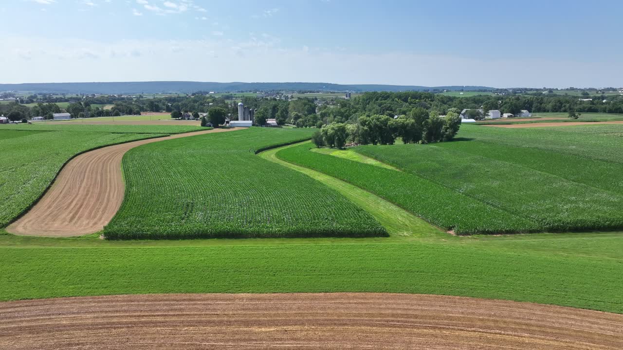 An aerial view of the lush green farmland of southern Lancaster County, Pennsylvania during the summer