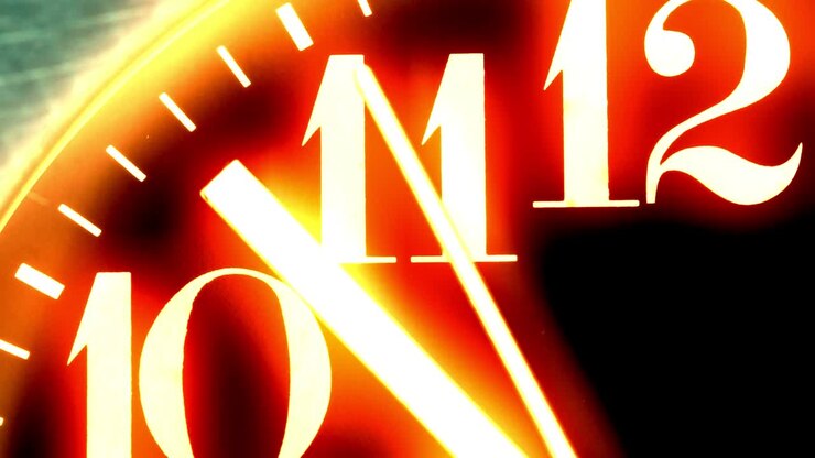Glowing fire clock close-up view.