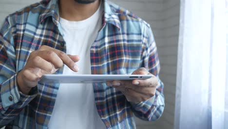 man using a tablet