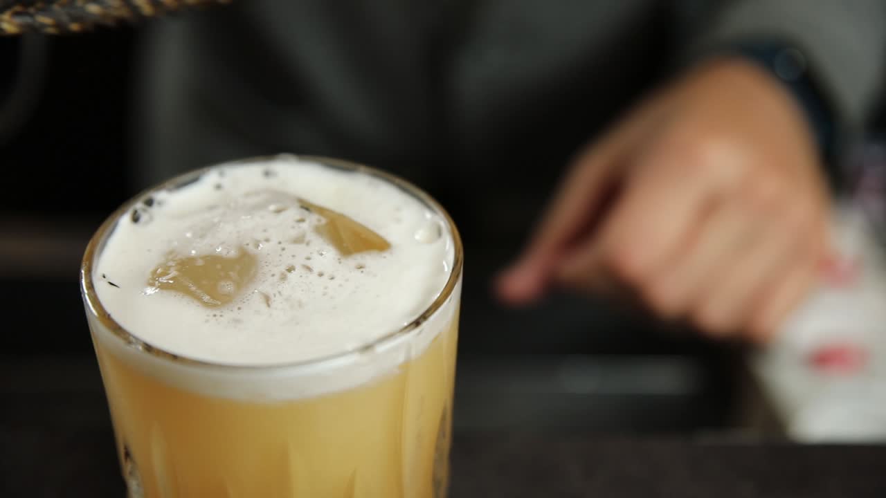 Preparing a cocktail at a bar