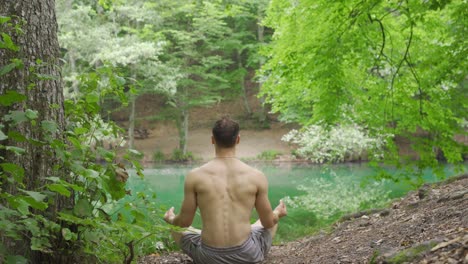 meditating by the lake.