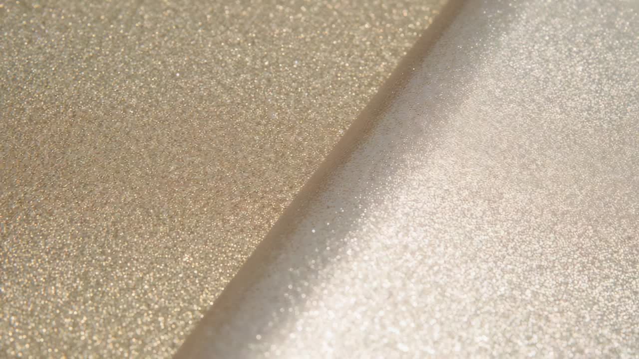 Shifting light causing metallic panels showing highlight shifts on table, slanted seam and sparkle