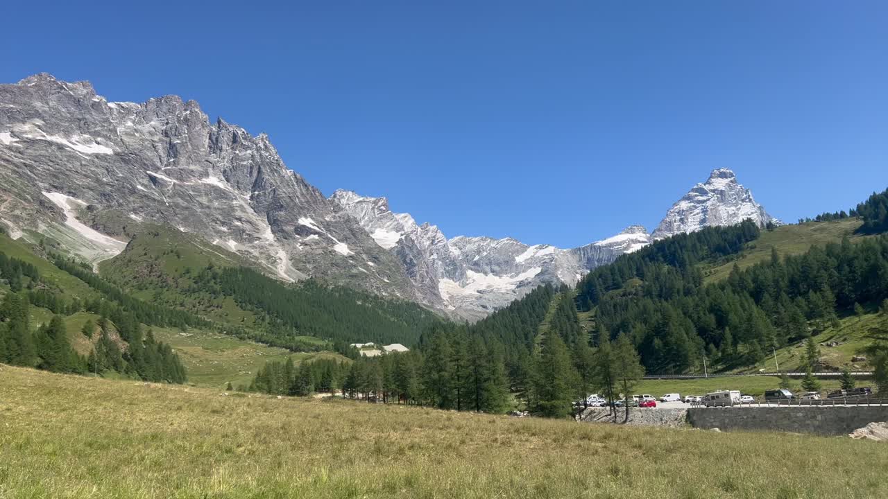 The Cervinia mountain is a green place in summer, for skiing in winter, with snow at the top. it carries feelings of loneliness, love, hate and awe, above all impression, aesthetic experience cold