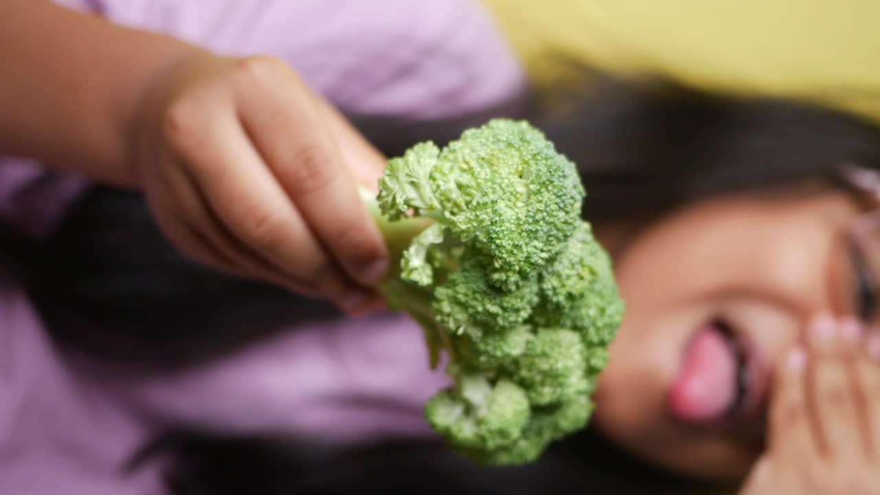 Child Disliking Broccoli