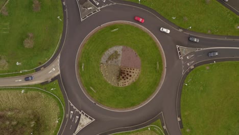 Top-aerial-spinning-shot-of-an-Irish-roundabout