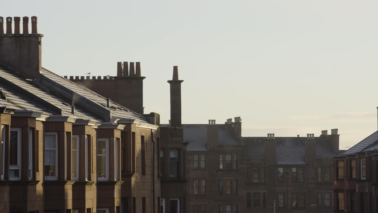 Golden Hour Over Classic Tenement Chimneys on a Crisp Winter Morning