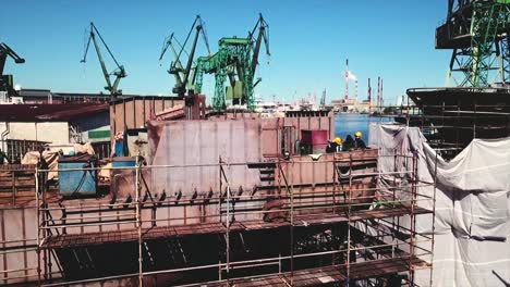 Drone-flying-up-and-forwards-to-the-shipyard