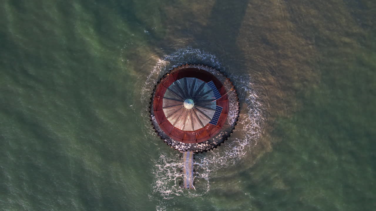 Aerial View of a Lighthouse in the Ocean