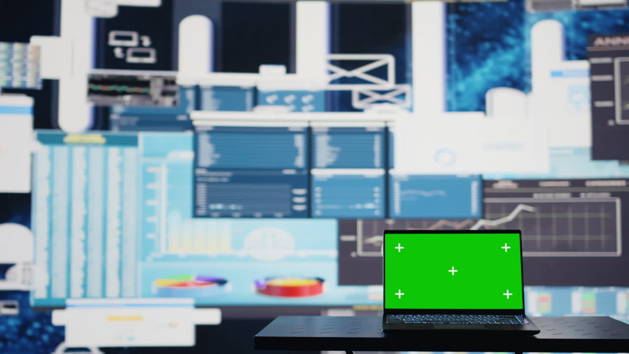 Isolated copy space screen running on laptop next to fintech annual reports