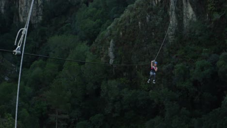 young caucasian woman zip lining