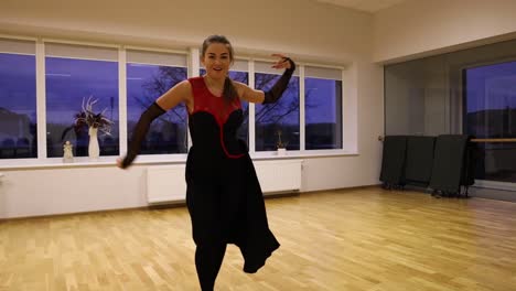 slow motion professional female dancer performing on the dance floor