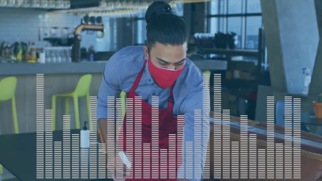 Bartender leaning over bar table using sanitizer in modern café displaying floating equalizer bars