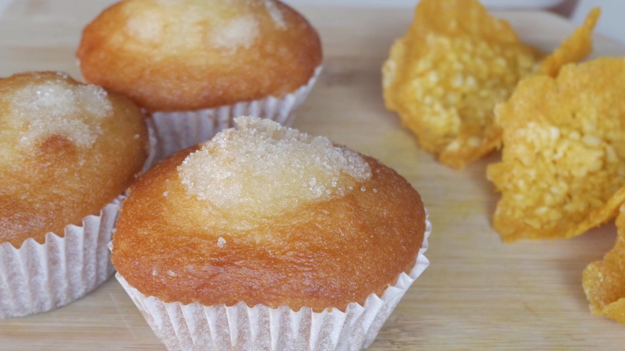 Fresh muffins on table, sunlight highlights cozy mood with Tejas touch