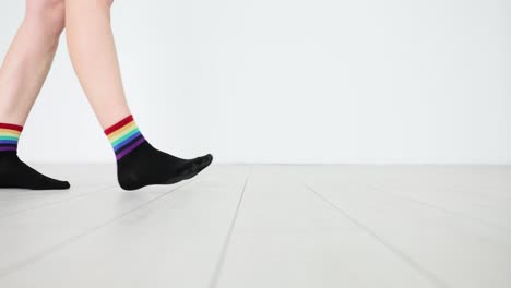legs with rainbow socks