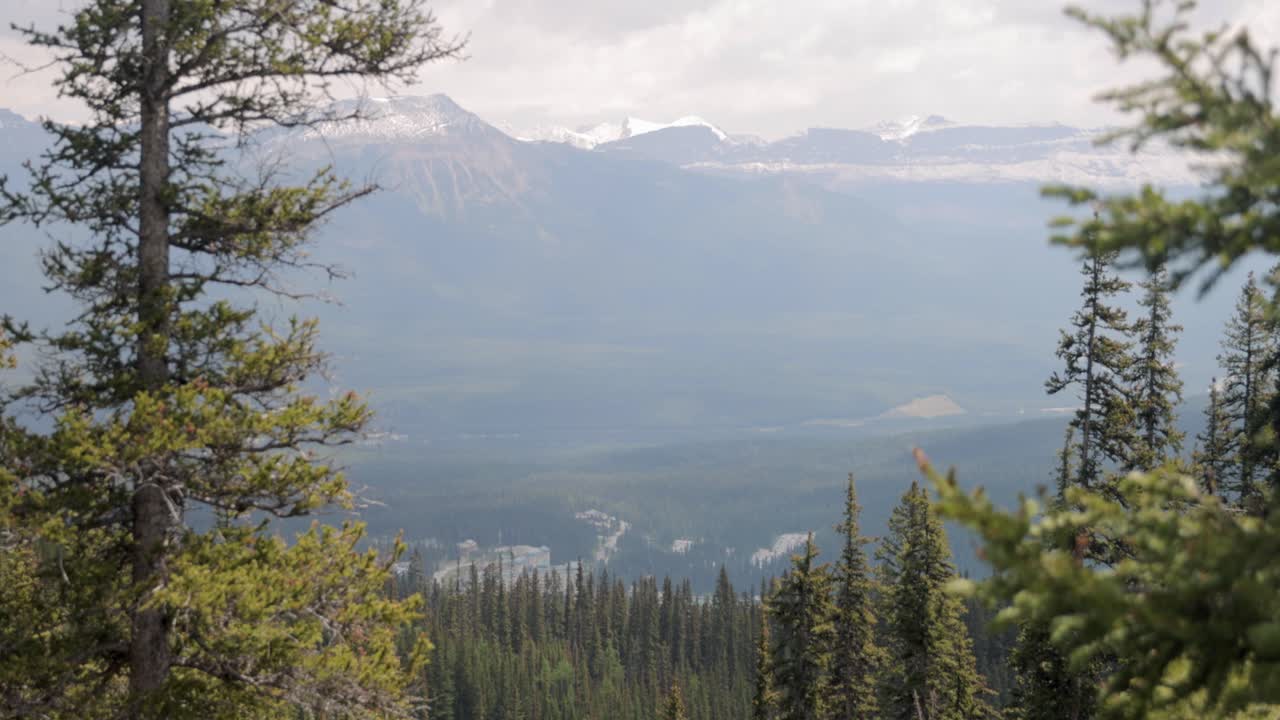 Looking down on Fairmont Lake Louise from the top of the hiking trail at Lake Agnes Tea House on Mount St. Piran and Mount Whyte, within Banff National Park near Lake Louise Alberta.
