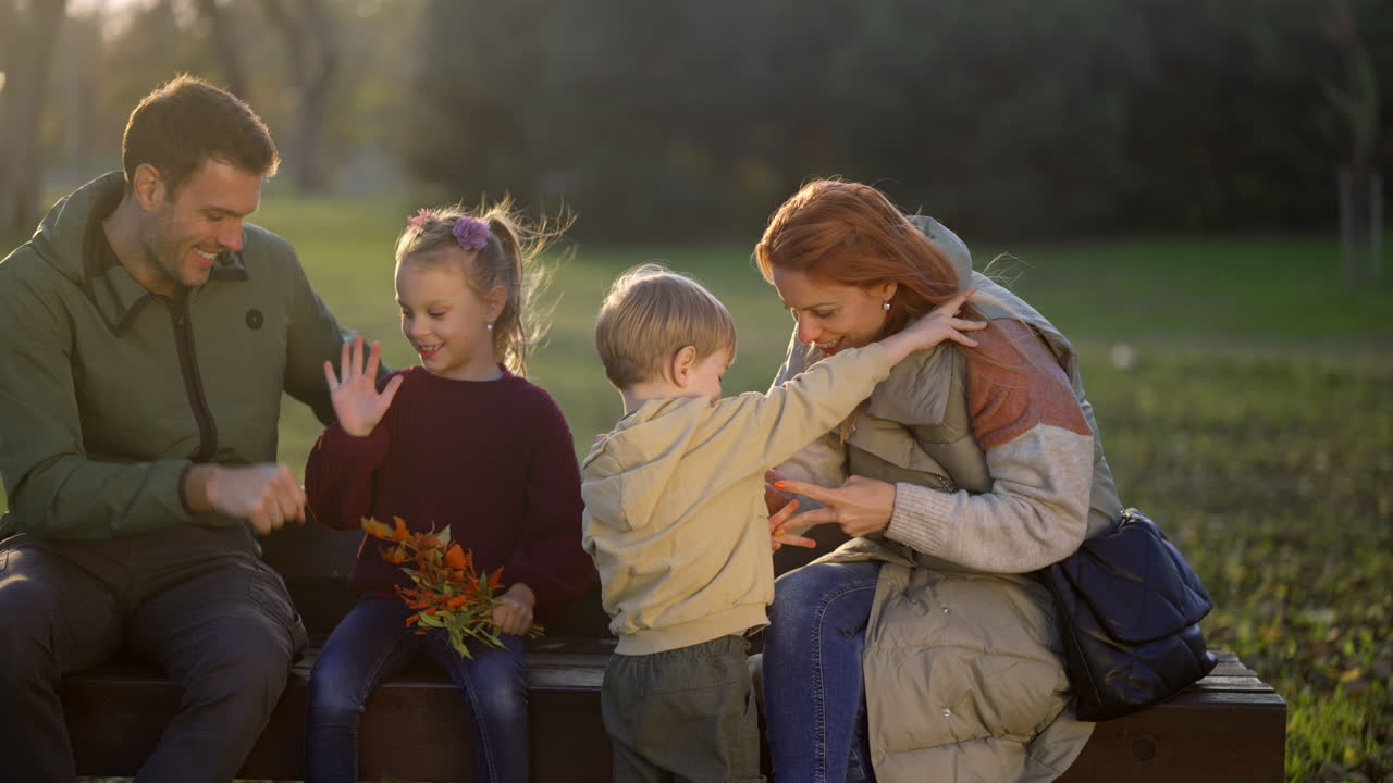 Family enjoying an autumn day at the park