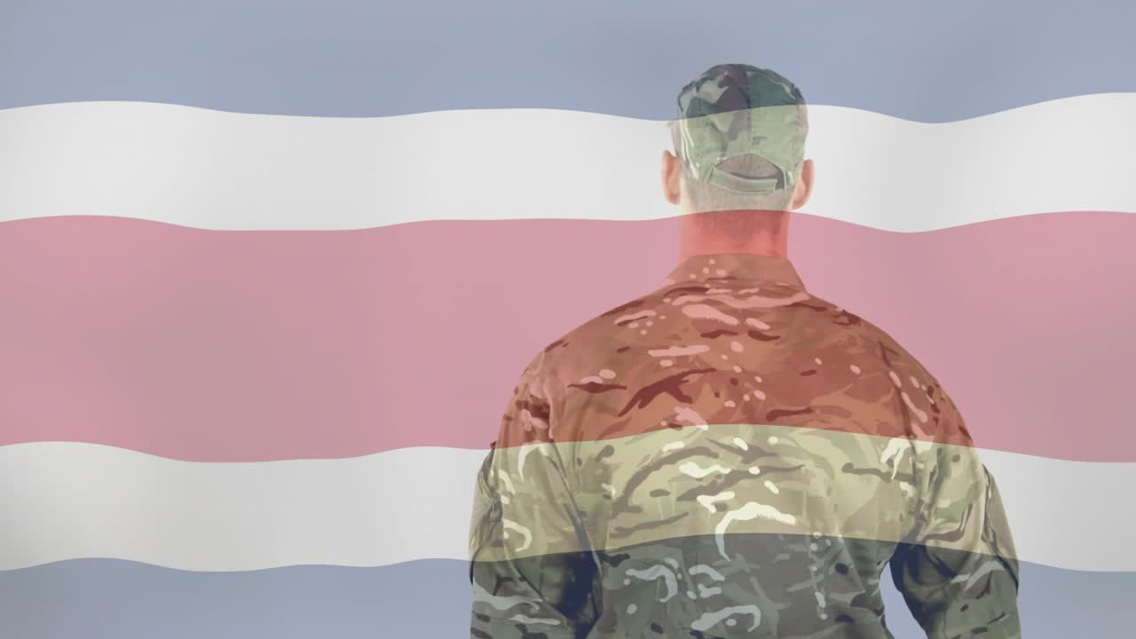 Soldier after pause releasing hands under semi-transparent flag overlay for defense simulation