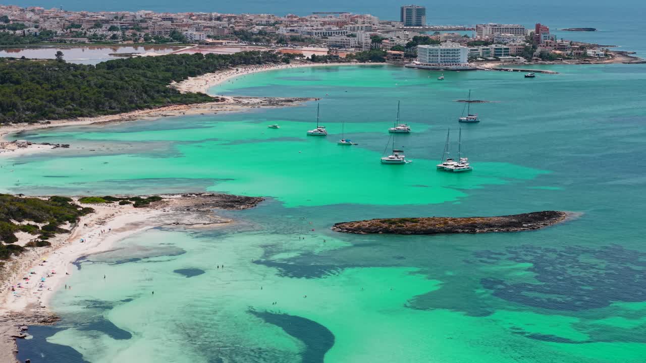 Aerial View of a Beautiful Coastline with Boats and Turquoise Water